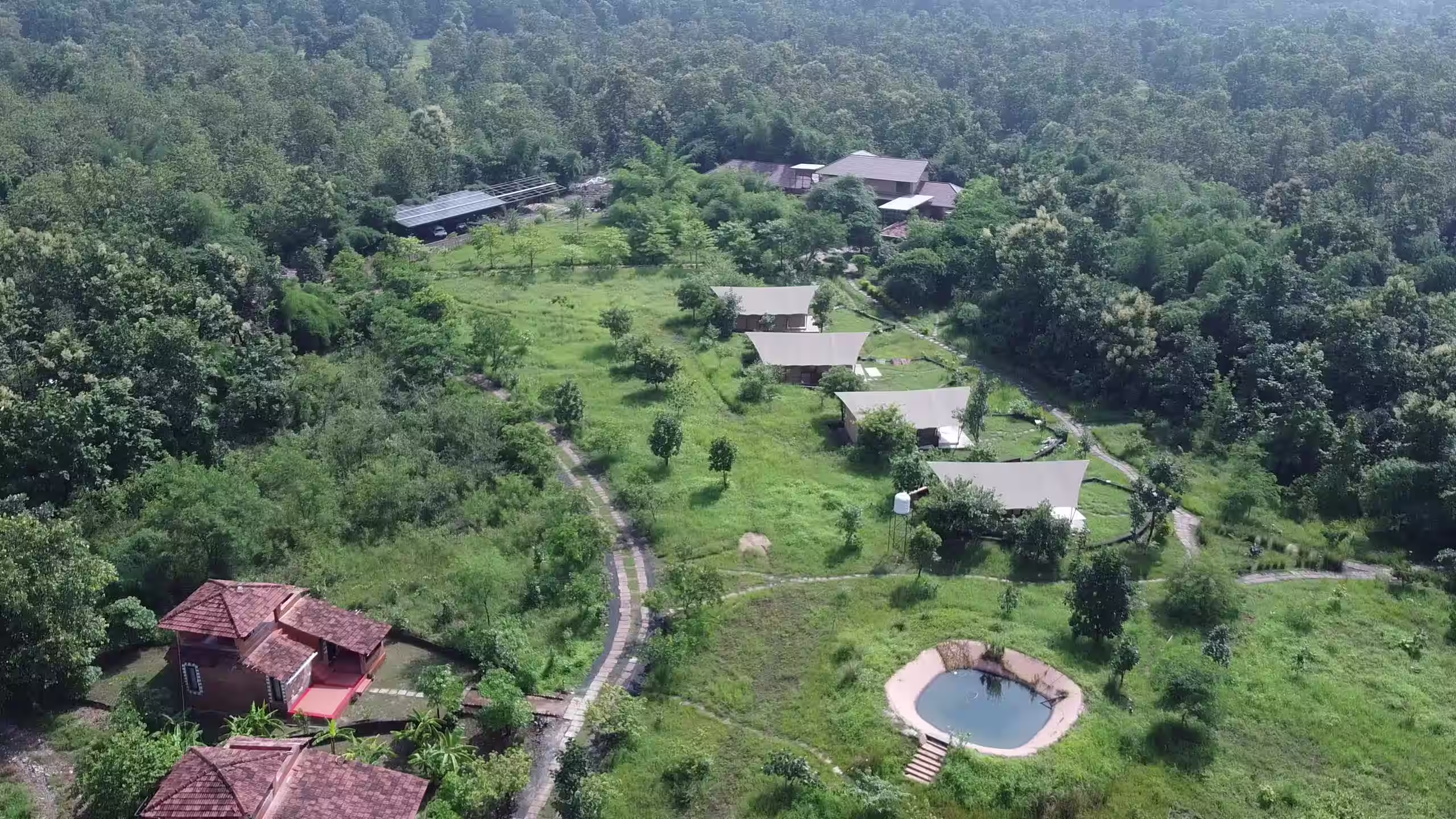 madhuban eco retreat forest view hero section 1
